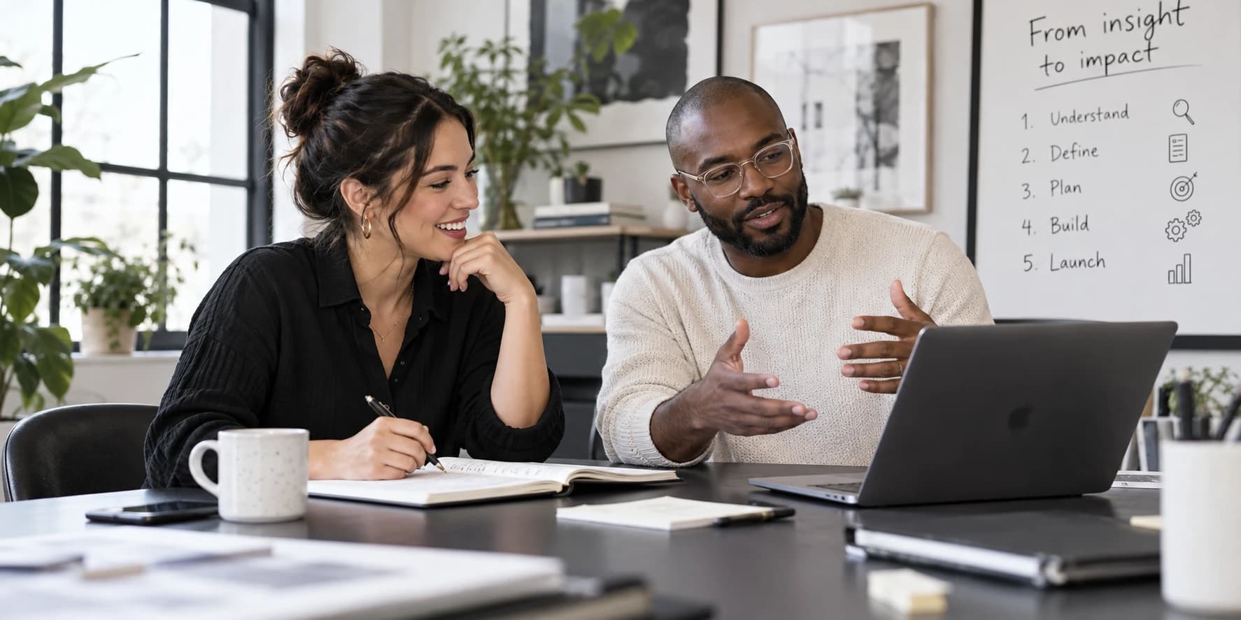 Agency strategist and client discussing the first steps of a digital project
