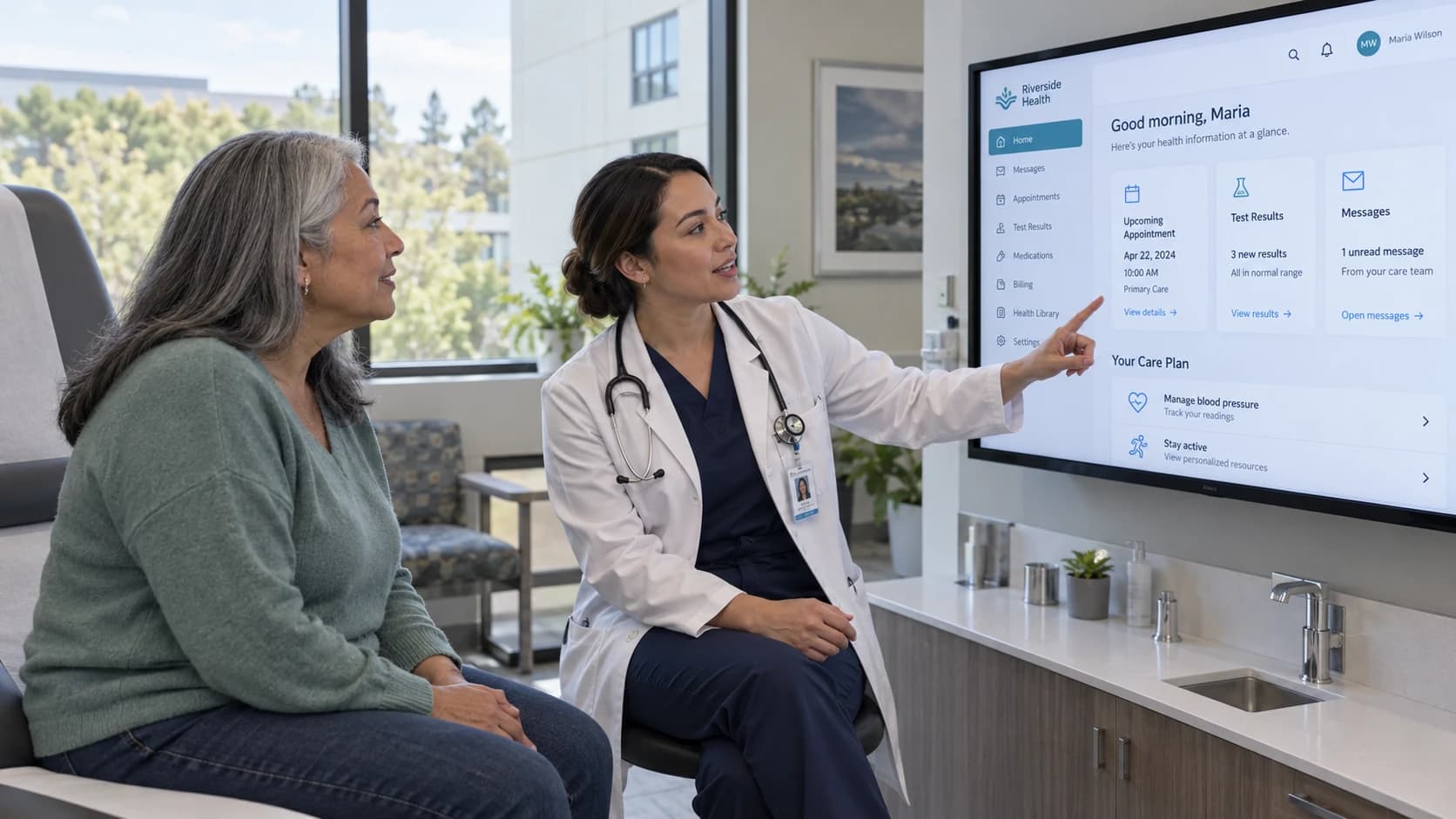 Clinician and patient reviewing a digital care portal together