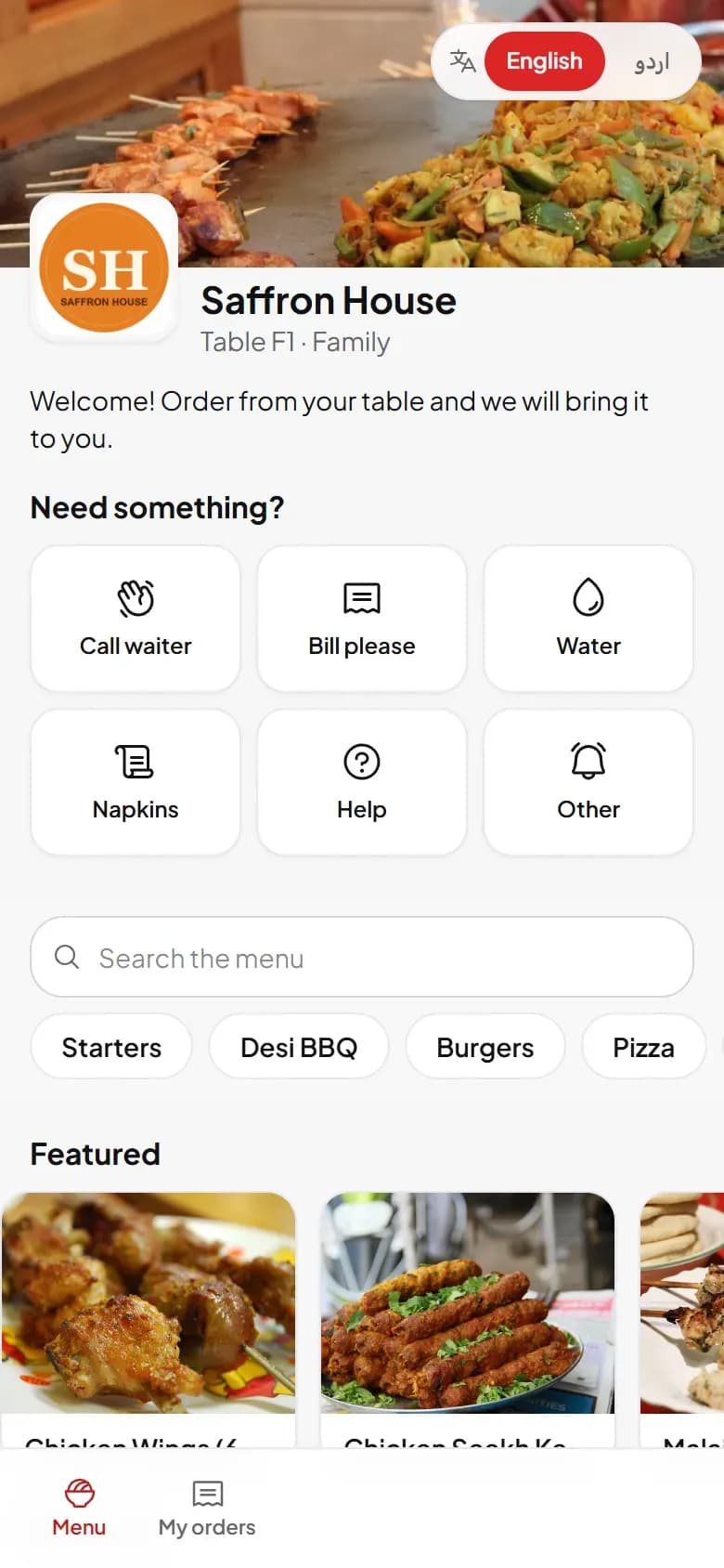 DishRoute QR table menu on a guest phone with waiter call buttons
